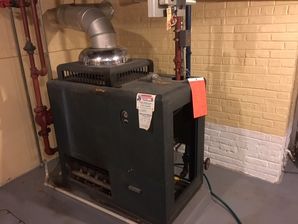 70 Year Old Boiler Replacement in Chicago, IL

Before, During & After (1)